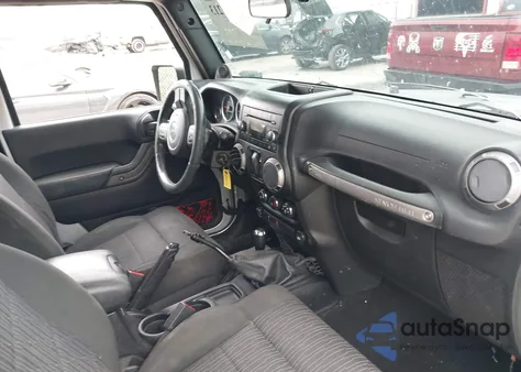 2011 Jeep Wrangler Sport z USA, uszkodzony, nr VIN 1J4AA2D11BL600750